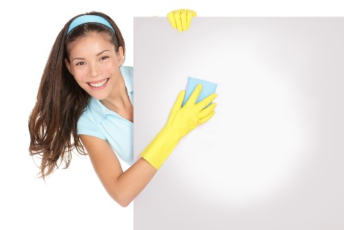 Local office cleaners working in a Canary Wharf business building