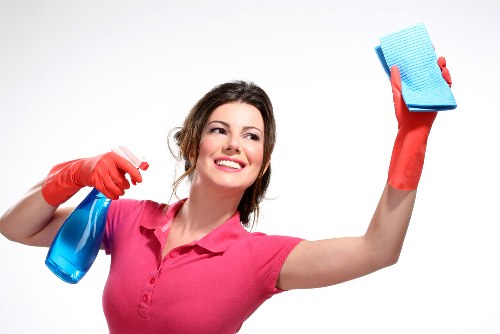 Insured cleaning team working carefully in a Canary Wharf property