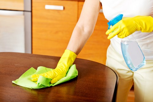 Local clearance crew handling office and residential items near Canary Wharf